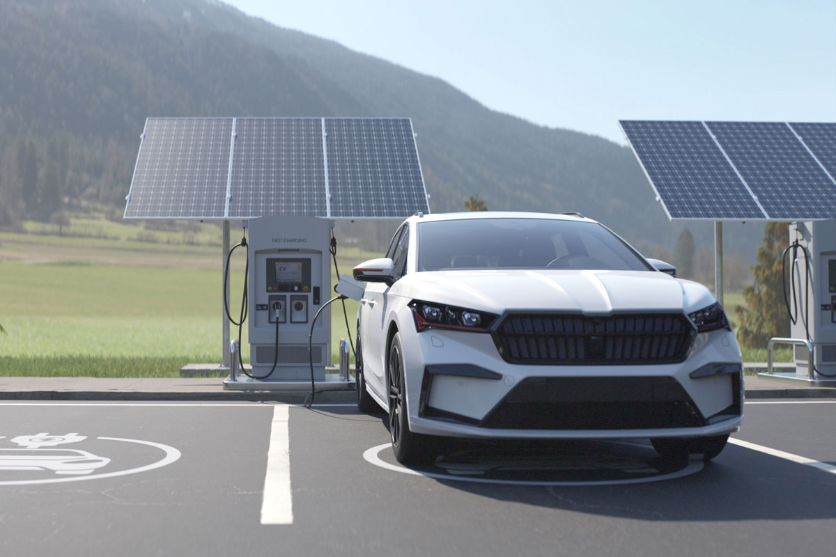 Electric,Vehicle,Recharges,At,A,Scenic,Charging,Station,Surrounded,By