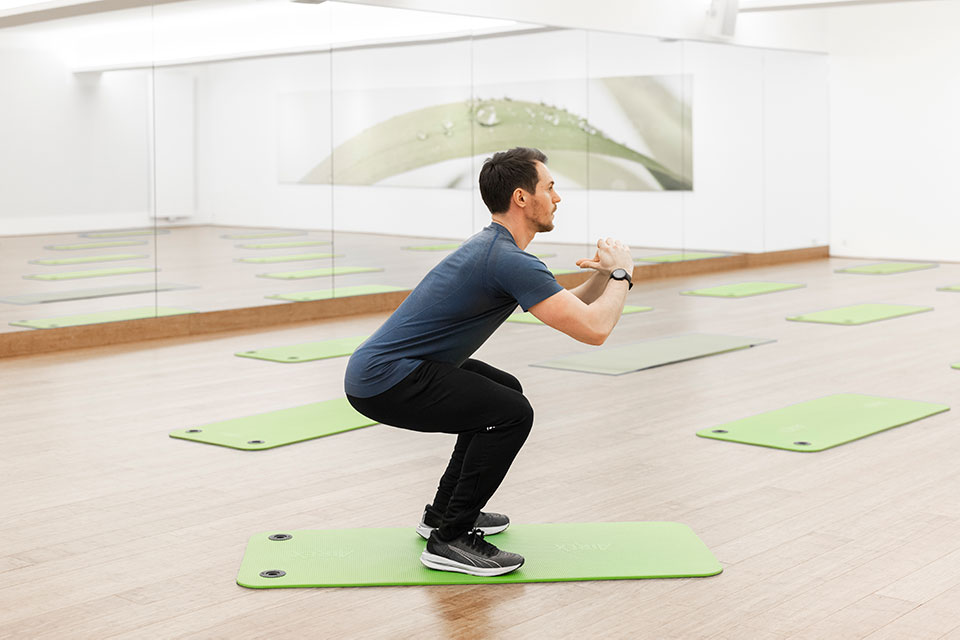 Fitnessübung Squat Foto: Marcel Kusch